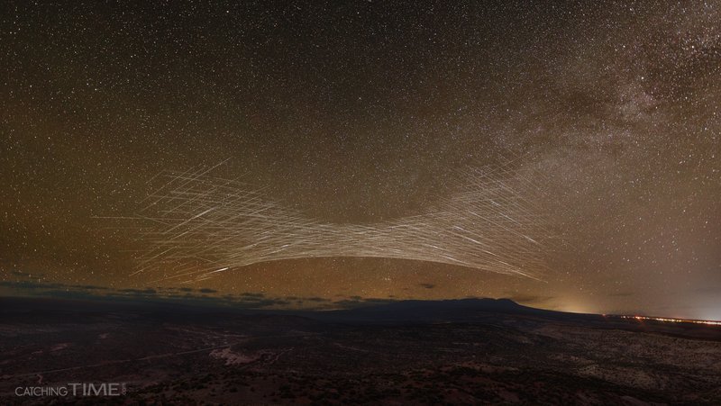 The Earth’s shadow, as delineated by sunlight reflecting off Starlink satellites passing overhead, captured in Utah on May 6-7, 2024